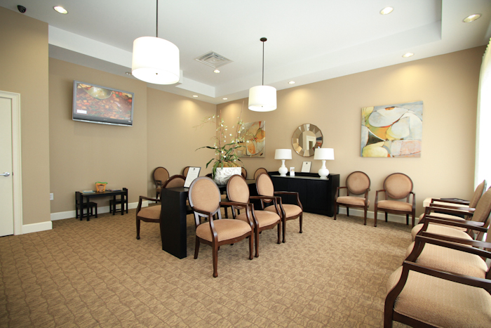 sitting area with brown chairs